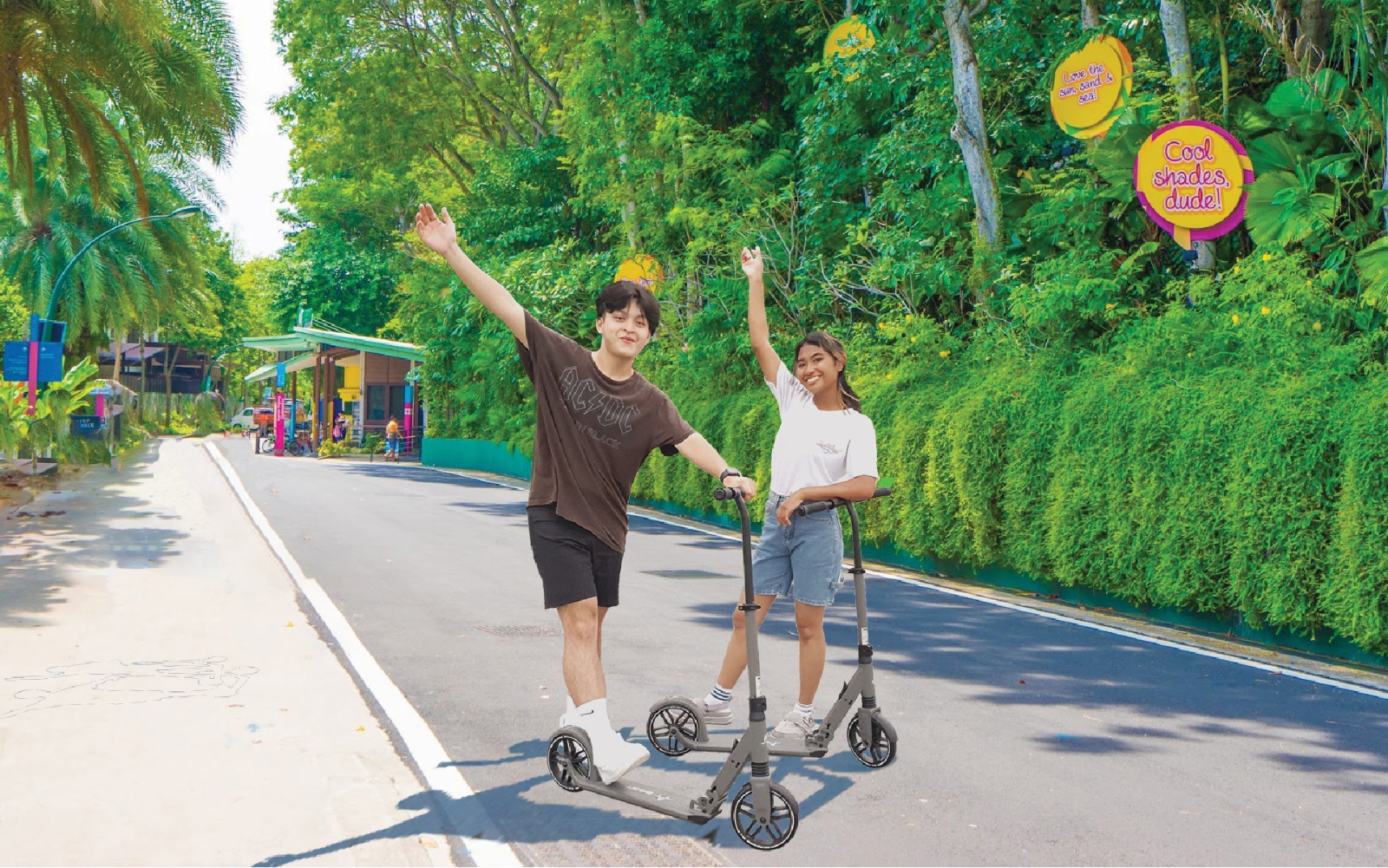 Couple posing in the garden with kick scooters with Gogreen